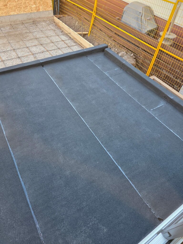 Completed flat roof membrane on a modern Calgary home
